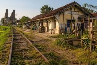 Ilustrasi jalur kereta api yang lama tak dipakai (ilustrasi dibikin ai - rentak.id)