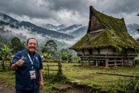 H. Amsyal di depan rumah adat Karo (Ilustrasi dibik aii - rentak.id).